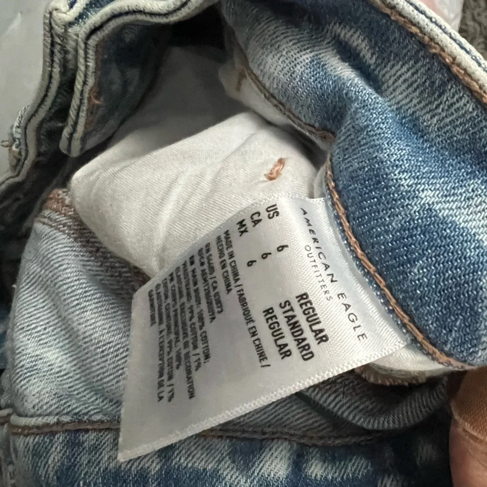 Ripped washed jeans - Picture 3 of 3